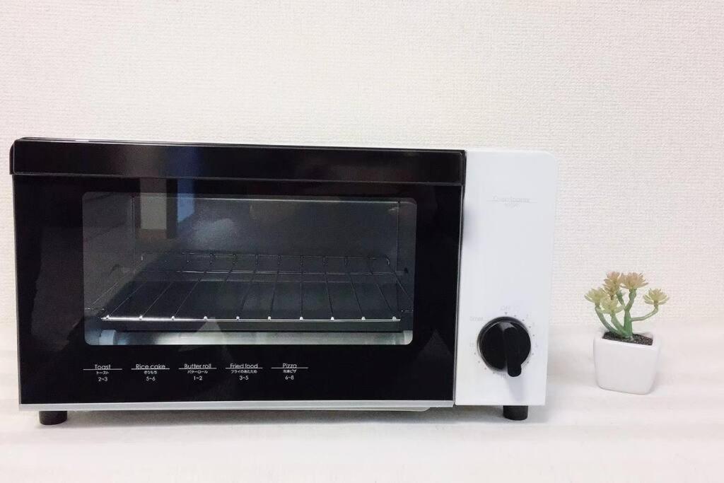 無料駐車場がある楽し一軒家－名古屋幸福の家 Нагоя Экстерьер фото